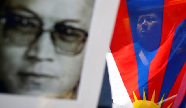 China says protected rights of jailed Tibetan monk who died